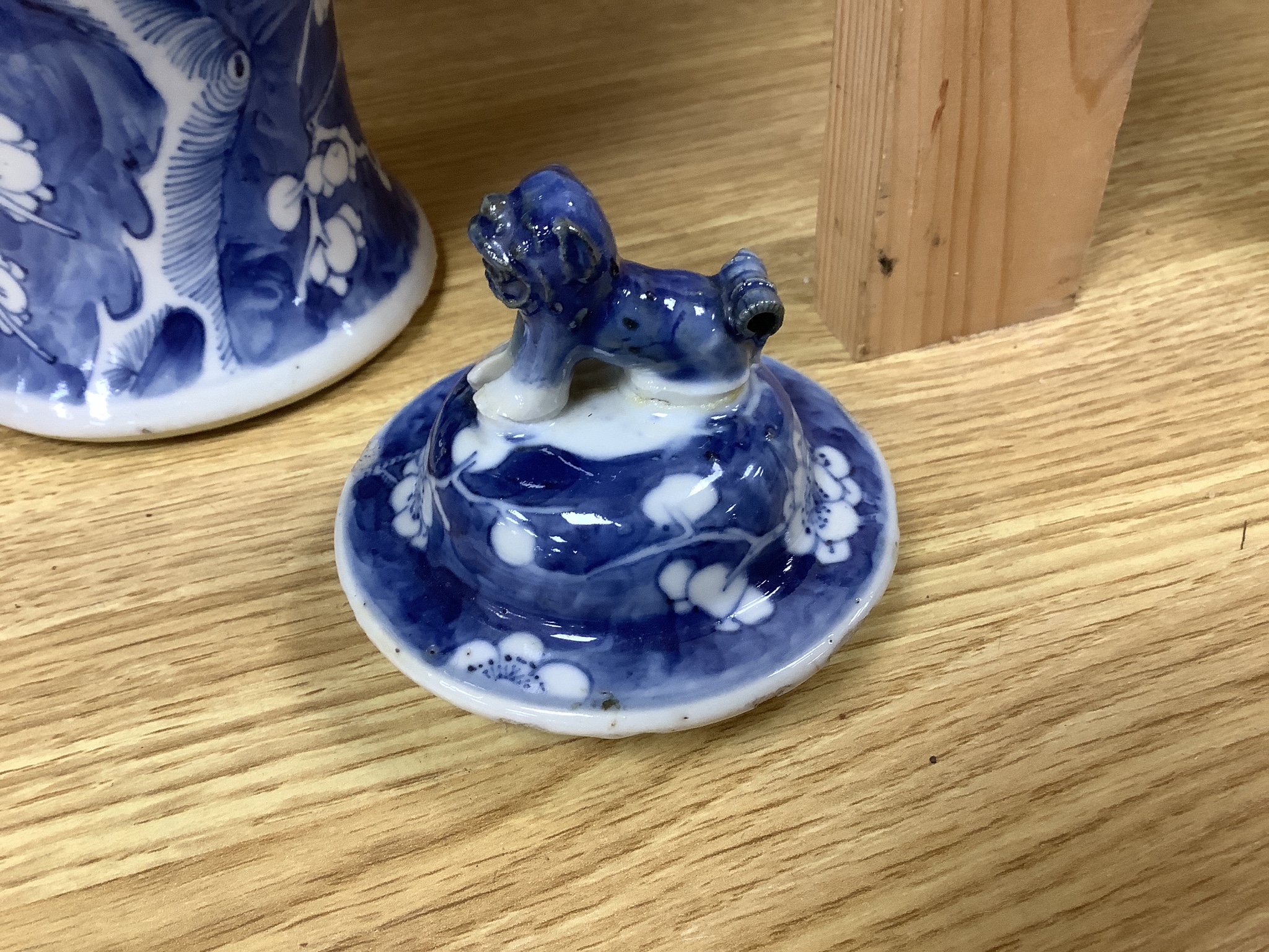 A 19th century Chinese blue and white 'prunus' vase and cover, height 33cm